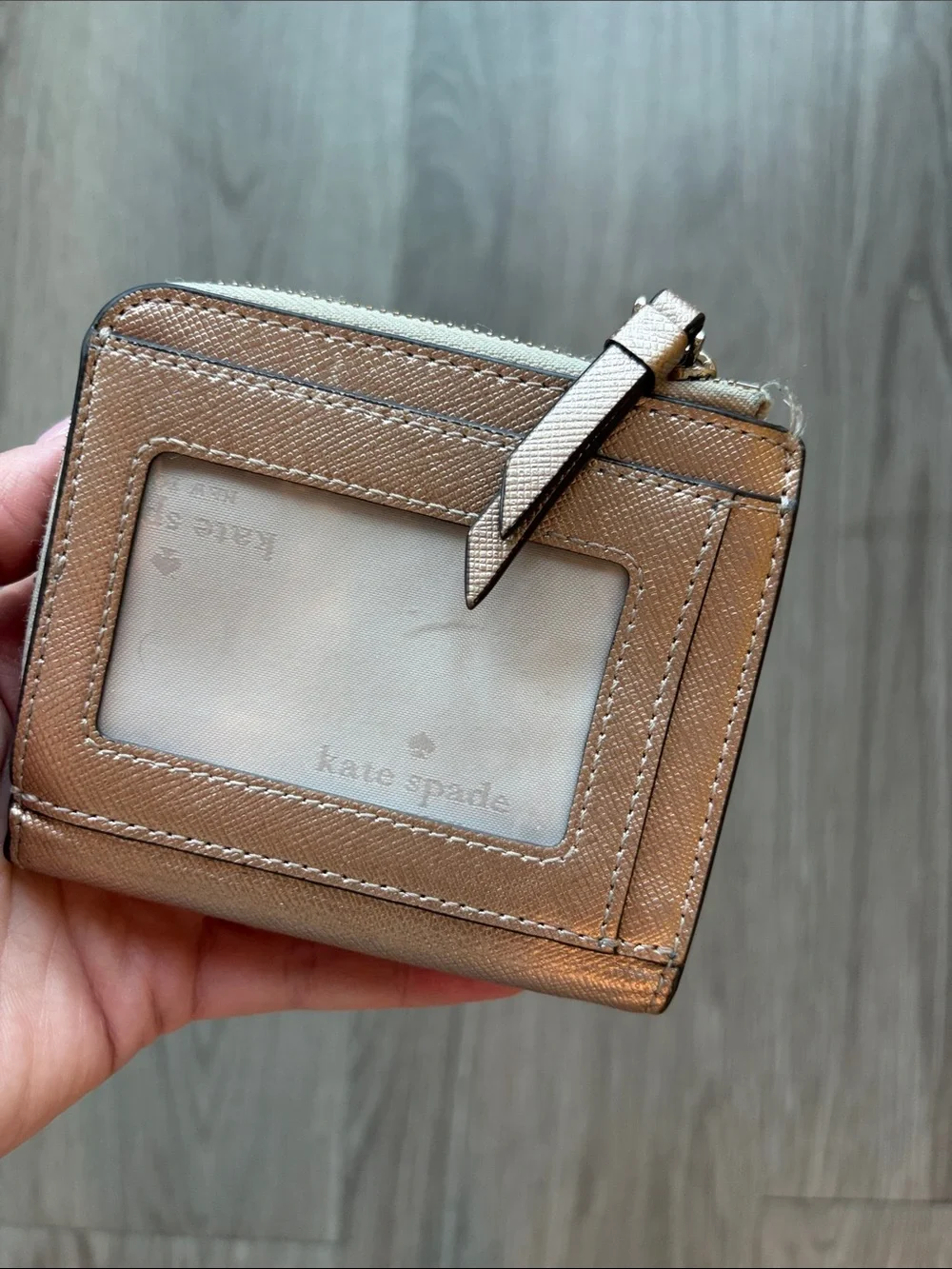 kate spade metallic rose gold zip-around wallet